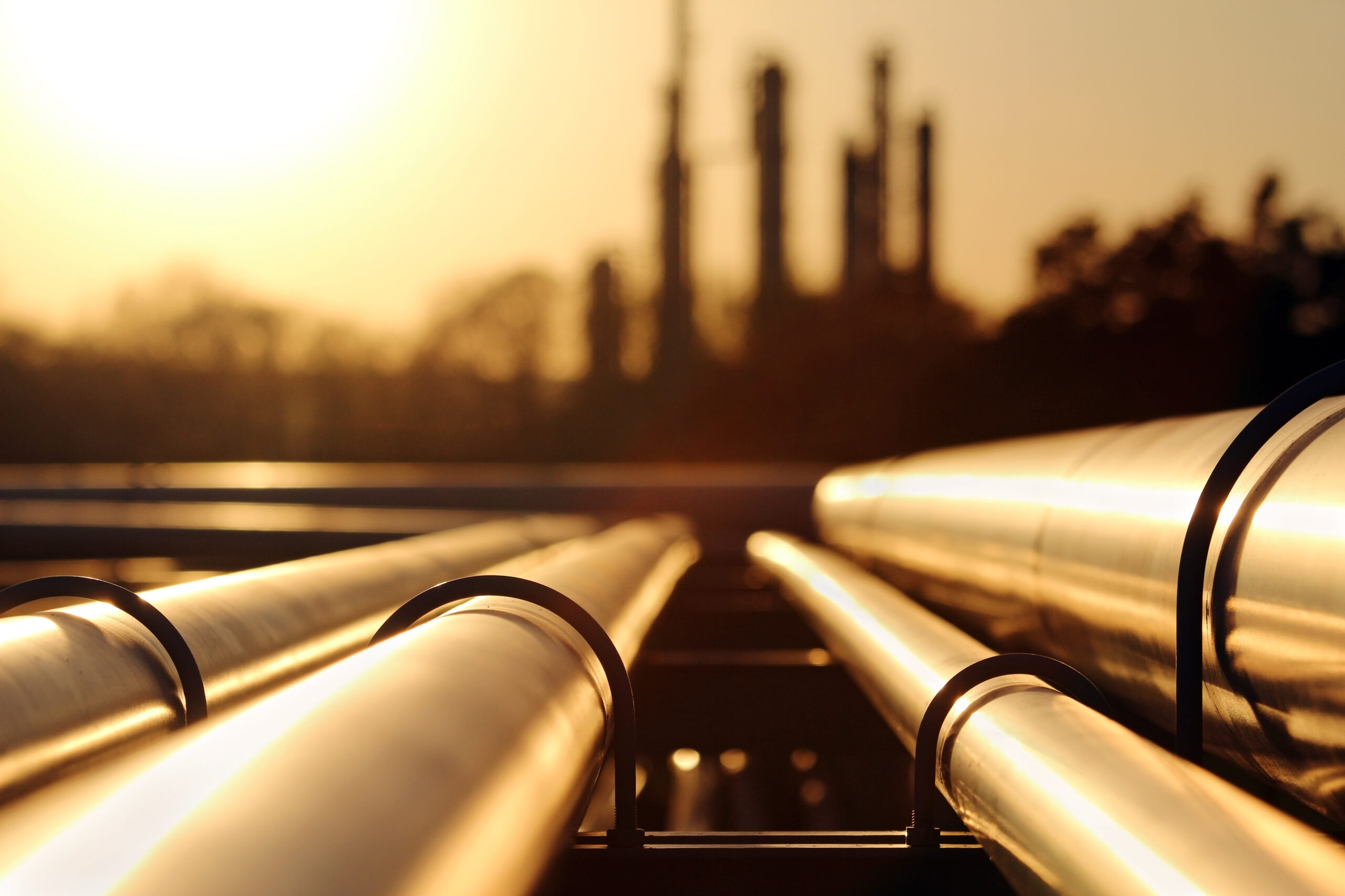 golden sunset in crude oil refinery with pipeline system golden sunset in crude oil refinery with pipeline system