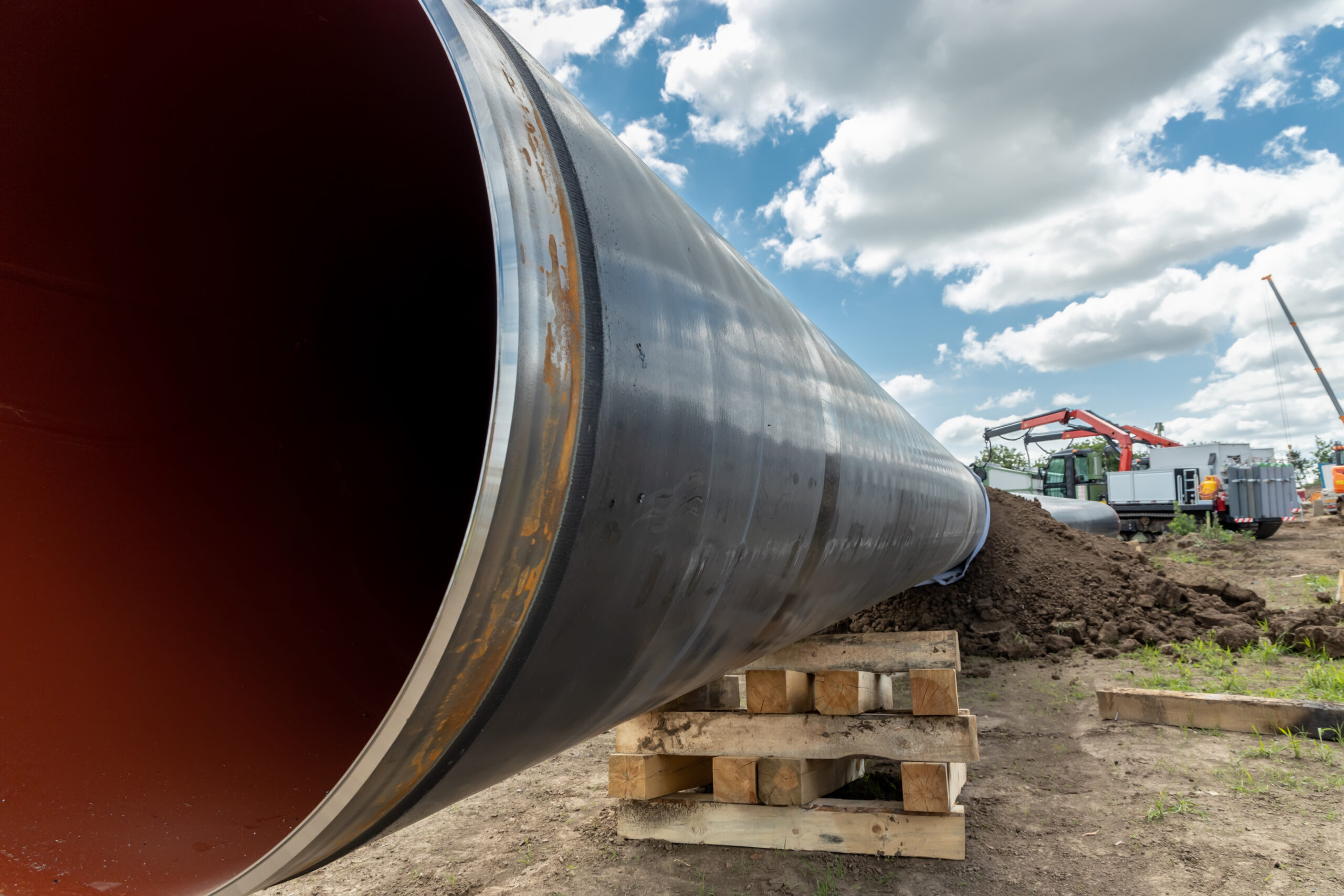Gas and oil pipeline construction. Pipes welded together. Big pi Gas and oil pipeline construction. Pipes welded together